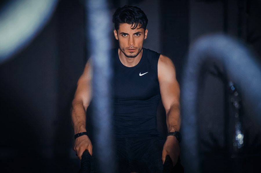 Illustrative photo of a personal trainer lifting a dumbbell